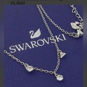 26. Swarovski three Crystal necklace with logo clasp new in original…